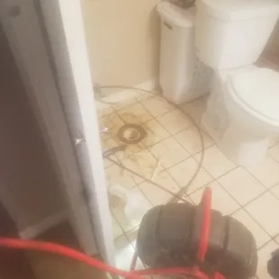 Camera drain line by removing stool for access
