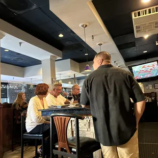 customers at the bar