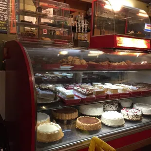 a display of cakes and pastries