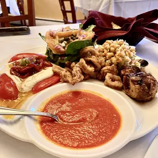 antipasto- mozarella, smoked salmon, calamari, chickpea salad &amp; artichokes.
