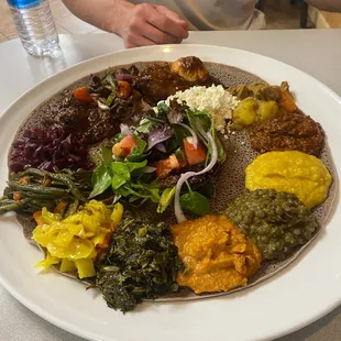 Top portion of plate - meat platter Bottom portion - Vegan platter
