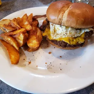 Food - The Aristocrat burger, wedges as the side.