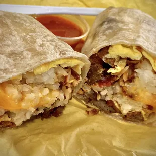 Sausage, bacon &amp; eggs breakfast burrito w/ hashbrowns &amp; cheese. Salsa on side, great.