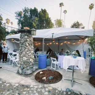Our backyard wedding celebration with canopies and tables from A&amp;H Party Rentals