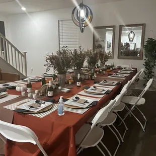 Chairs, tables, linen runner and chargers