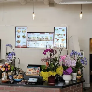 a display of flowers in a restaurant