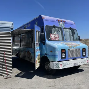 a blue food truck
