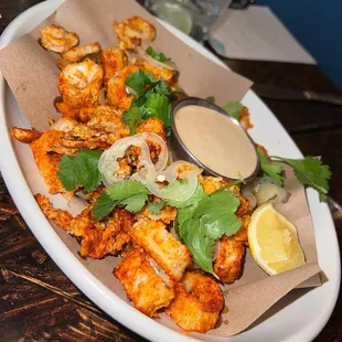 CRISPY CALAMARI $14 salt &amp; pepper style, lemon, maggi aioli