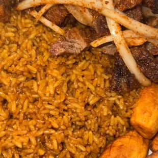 Suya, jollof rice and plantains. So good!