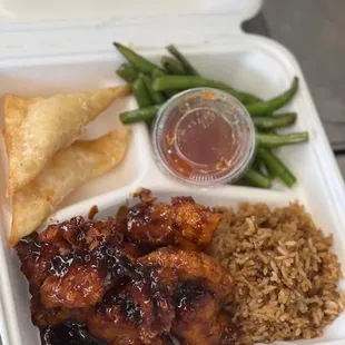 a meal in a styrofoam container