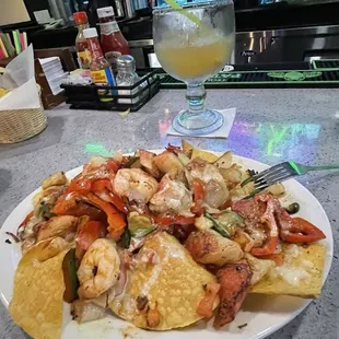 Seafood Nachos Gold signature margarita