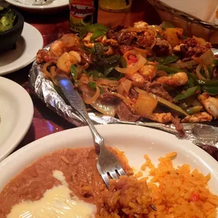 Beef , shrimp, chicken and chorizo fajita. Killer!!