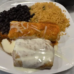 Chicken chimichanga with chicken burrito, rice and beans.