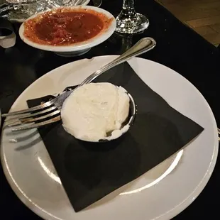 a plate of food and a glass of wine