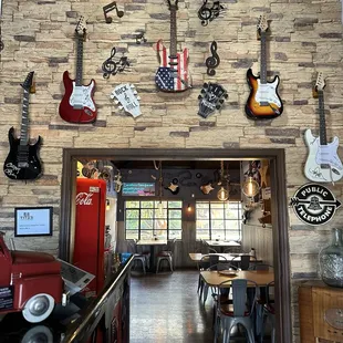 Near the cashier station.  Look at those guitars!
