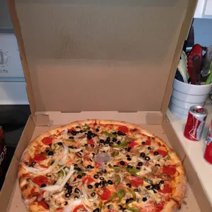 This is a large supreme with onions only on half.. Best pizza in spring hill