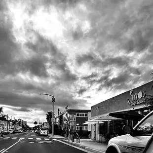 a black and white photo of a street