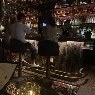 people sitting at the bar