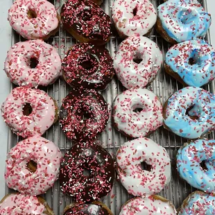 a variety of doughnuts with sprinkles