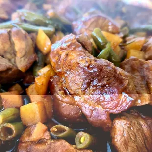 Pork butt on morita sauce with string green beans and potatoes