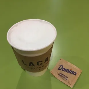 a cup of coffee and a condom