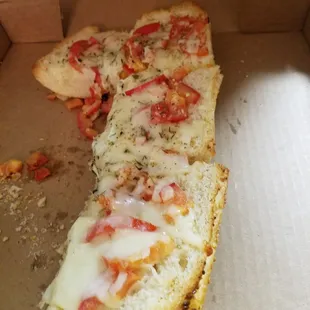 a slice of pizza in a box