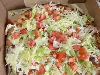 Almont Roza's Pizza