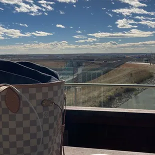 Grill cheese with beef brisket &amp; patio view.