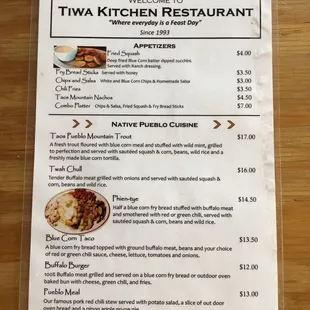 a menu for a tiwa kitchen restaurant