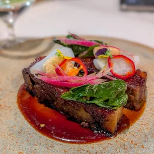 Pomegranate glazed pork bellly - the sweet of the sauce balanced the rich saltiness of the pork.  Great addition