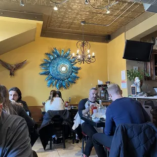 a group of people sitting at tables