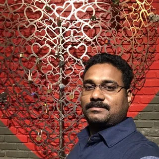 Shyam S.