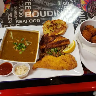 Combo Fried catfish fillet, blackened catfish fillet, dirty rice, crawfish etouffee