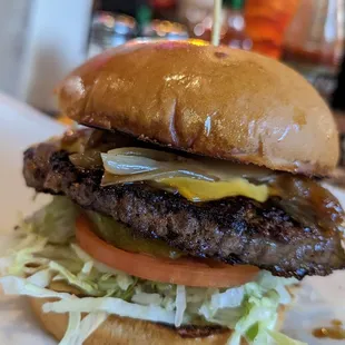 Cheese burger with grilled onions.