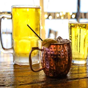 a mug of beer and a mug of tea