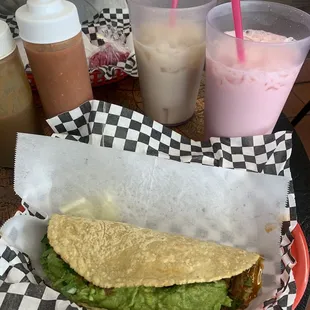 Best birria quesadilla ever. Strawberry drink and horchata! So good!