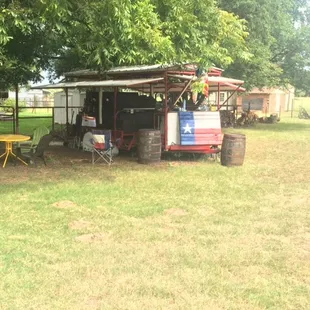 ows a man sitting under a tree