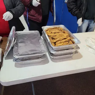 two trays of food on a table