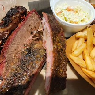Two meat plate (brisket and ribs) with slaw and fries