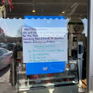 a sign in the window