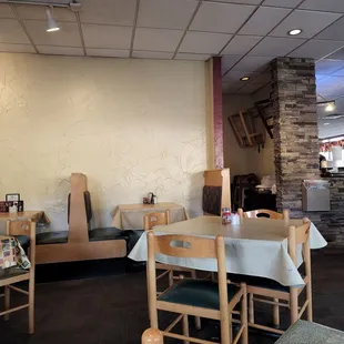 a restaurant with tables and chairs