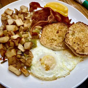 Inn-Joyable breakfast.  Two eggs, potatoes, choice of bacon or sausage, and toast