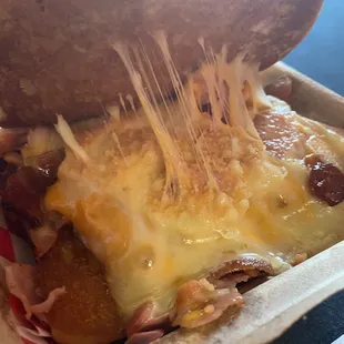 a sandwich with cheese and meat