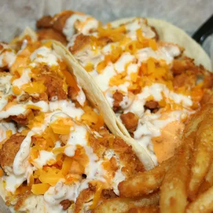 two tacos and french fries