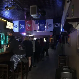people sitting at the bar