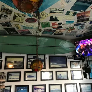 a surfboard suspended from the ceiling