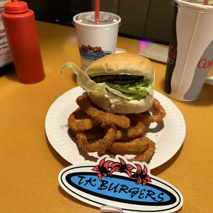 Burger with onion rings and a sticker