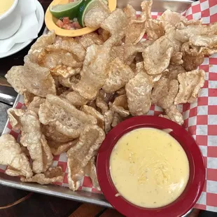 Pork rinds with queso