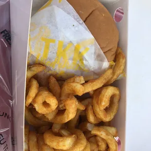 Spicy chicken sandwich combo with curly fries