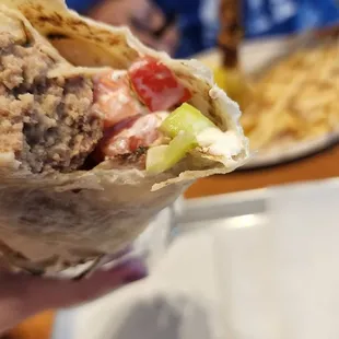 Wrap, with meatballs, feta, fries, olives and no greens and no onions